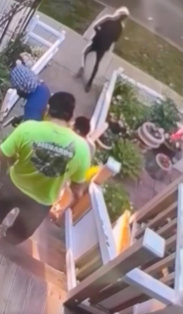 A chilling video captured the moment a Chicago resident was robbed at gunpoint by a group of people in masks.