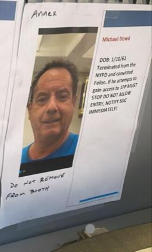 The sign banning Michael Dowd from NYPD headquarters. 