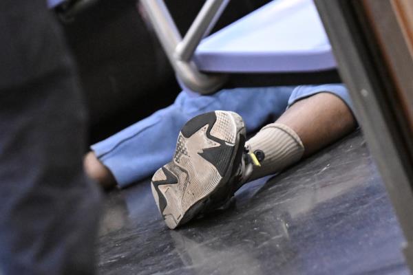 Jordan Neely's feet on the subway car after his death. 