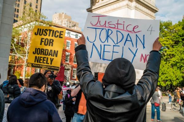 A protestor demanding justice for Jordan Neely