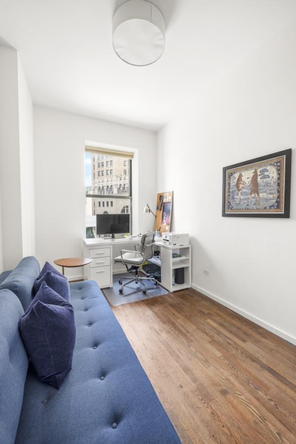 A den which can be transformed into a second bedroom or office.