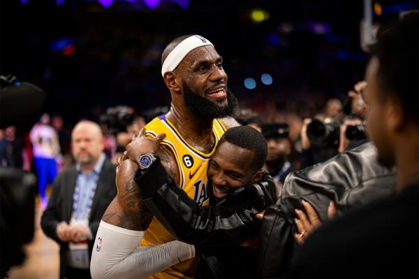 LeBron James (l.) and agent Rich Paul (r.) embrace following a Feb. 7, 2023 game.