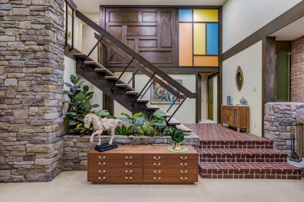 The interiors were filmed on a stage, but the real-life house had its inside remodeled to resemble the set.