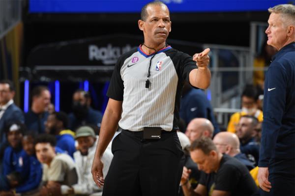 Eric Lewis referees a Los Angeles Lakers game against the Golden State Warriors in the 2023 NBA playoffs.