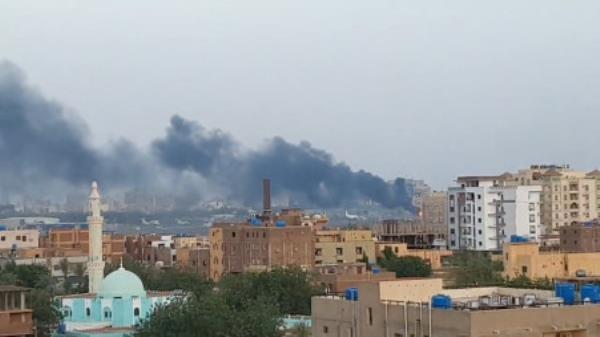 Smoke rises from the tarmac of Khartoum Internatio<em></em>nal Airport as a fire burns, in Khartoum, Sudan April 17, 2023 in this screen grab obtained from a social media video. Abdullah Abdel Moneim/via REUTERS