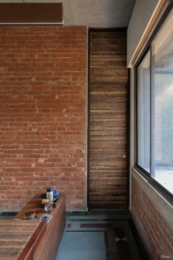 Door can be designed at full height to define the scale of the space in a room. Photo: Junaid Hasan Pranto