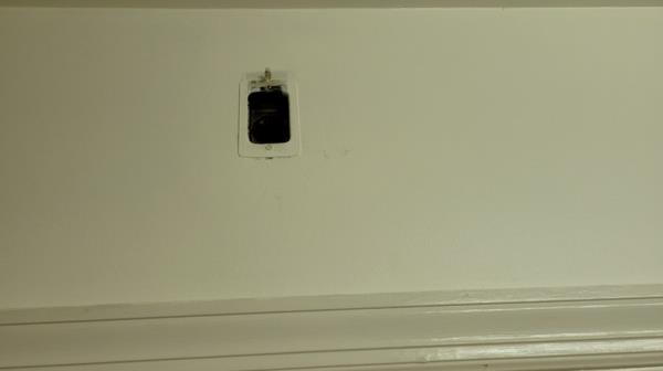 power outlet above a door