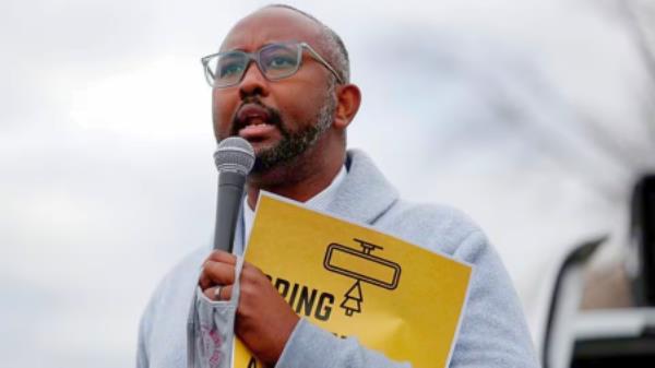 File photo: Jaylani Hussein, Executive Director of CAIR-Minnesota, speaks in front of activists and protesters, as protests co<em></em>ntinue days after former police officer Kim Potter fatally shot Daunte Wright, in Brooklyn Center, Minnesota, U.S. April 15, 2021. REUTERS