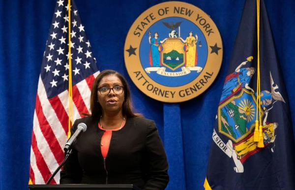 Letitia James speaking at a podium 