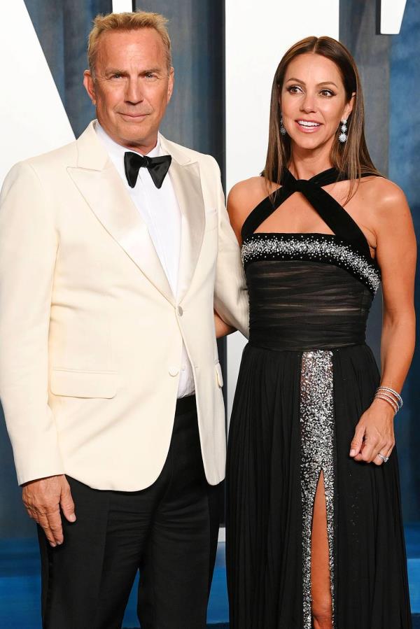 Kevin Costner and Christine Baumgartner attend the Vanity Fair Oscar Party on March 27, 2022 in Los Angeles, California.