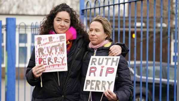 Ellen (left) and Liz (surnames not given) outside the gates to John Rankin Schools in Newbury, Berkshire, wher<em></em>e headteacher Flora Cooper is planning to refuse entry to Ofsted inspectors following the death of the leader of a nearby school, Ruth Perry. Ms Perry, who was head at Caversham Primary School in Reading, killed herself in January while waiting for an Ofsted report which gave her school the lowest possible rating, her family said. Picture date: Tuesday March 21, 2023.