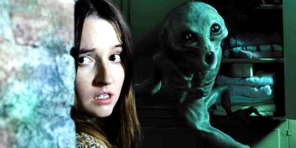 Brynn hiding while an alien gets agitated in No One Will Save You