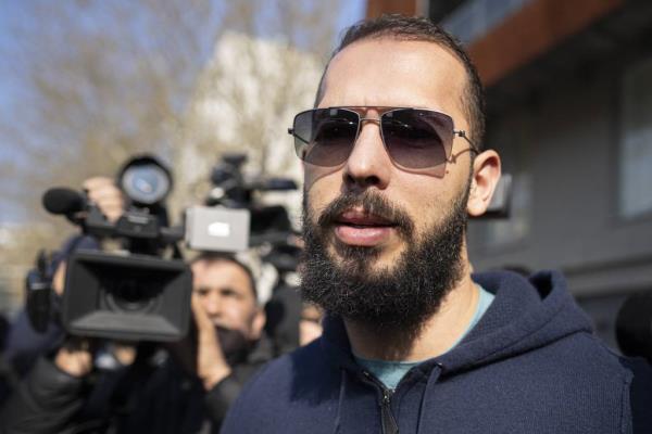 Andrew Tate leaves the Directorate for Investigating Organized Crime and Terrorism (DIICOT), in Bucharest, Romania, Monday, April 10, 2023.