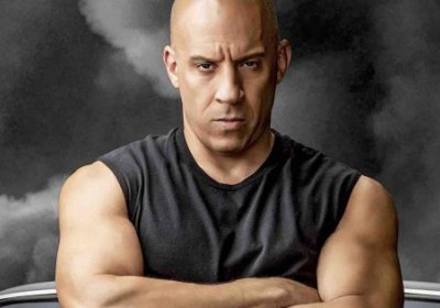 Dwayne The Rock Johnson looking down on Vin Diesel in Fast and Furious