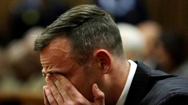 Former Paralympian Oscar Pistorius attends the sentencing for the murder of Reeva Steenkamp at the Pretoria High Court