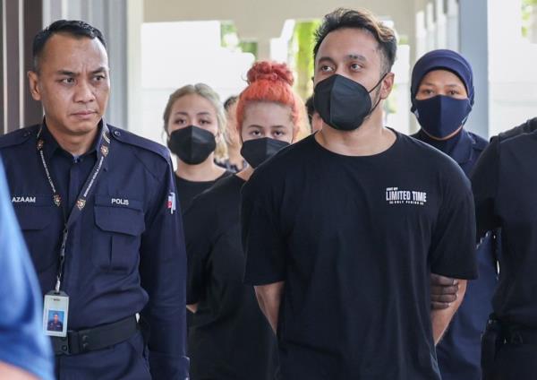 Advertising sexual services online: Man, two female companions claim trial in Kuala Lumpur
