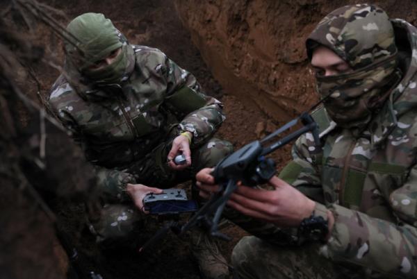 Two soldiers with the 58th Independent Motorized Infantry Brigade of the Ukrainian Army who wanted to be identified as 