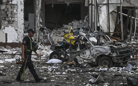 A view of a destroyed car as the Ukrainian police co<em></em>ntinue their investigation near the destroyed Reikartz hotel after Russian missile strike in Zaporizhzhia, Ukraine on August 11, 2023.