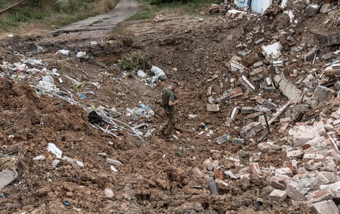 A Ukrainian soldier stands on the debris of destroyed houses after Russian shelling at the city of New York (Niu-York) as Russia-Ukraine war co<em></em>ntinues in Do<em></em>netsk Oblast, Ukraine on August 10, 2023.