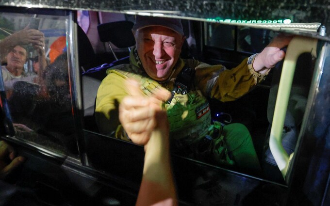 Yevgeny Prigozhin is greeted by supporters as his troops leave Rostov-on-Don