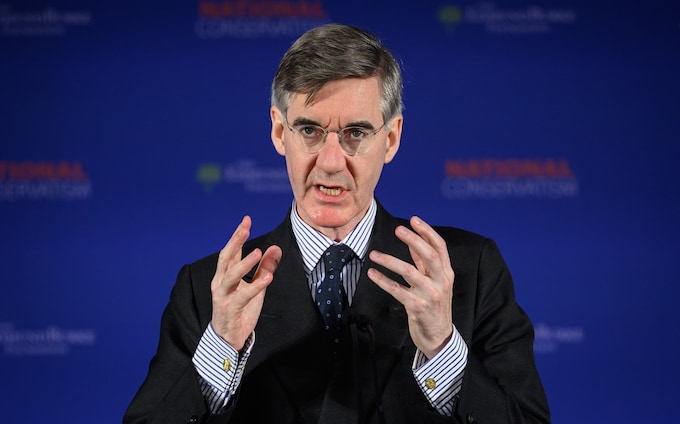 Sir Jacob Rees-Mogg, the former business secretary, is pictured at a co<em></em>nference in central Lo<em></em>ndon on May 15 this year 