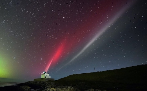 The rare aurora-like phenomenon STEVE, named in 2016 by scientists in Canada, was also seen over Bamburgh Castle in Northumberland