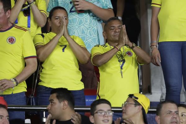 Luis Diaz’s parents Cinelis Marulanda and Luis Manuel Diaz have been flown to Merseyside by Liverpool (Ivan Valencia/AP)