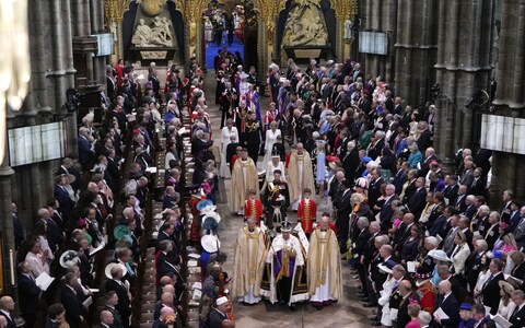 Mr Dymoke joins King Charles III, front center, and Queen Camilla, middle center, during the Coro<em></em>nation Procession