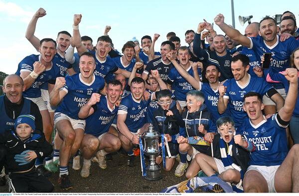 The Naomh Co<em></em>naill team celebrate with the cup after the Do<em></em>negal County Senior Club Football Champio<em></em>nship final. Pic: Ramsey Cardy/Sportsfile