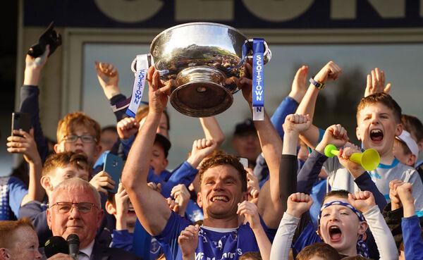Scotstown's Damien McArdle celebrates with the cup. Pic: ?INPHO/Leah Scholes