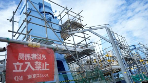 FILE - Seawater transfer pumps of the Fukushima Daiichi nuclear power plant are seen during a treated water dilution and discharge facility tour for foreign media, in Futaba town, northeastern Japan, Aug. 27, 2023.