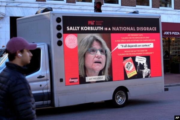A truck with electro<em></em>nic panels is seen Dec. 12, 2023, near Harvard University, in Cambridge, Massachusetts, with messages critical of testimony to Co<em></em>ngress by three university presidents regarding antisemitism. Pictured is MIT President Sally Kornbluth.