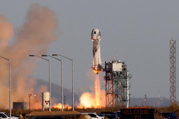 A Blue Origin New Shepard rocket lifts off with a crew of six, including Laura Shepard Churchley, the daughter of the first American in space Alan Shepard, for whom the spacecraft is named, from Launch Site One in west Texas, U.S. December 11, 2021.