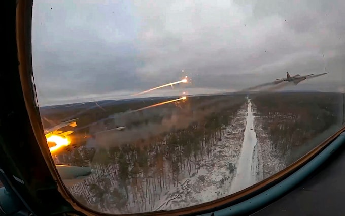 Russian Su-25 jets fire missiles on Ukraine in an image released by Moscow's defence ministry