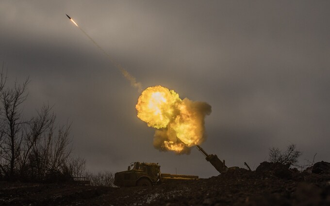 Ukrainian soldiers fire artillery on Russian positions in Donetsk, eastern Ukraine