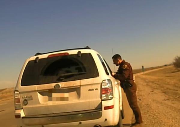 Trooper Jesse Gregory pulled over a vehicle as part of a traffic stop on 18 January. Credit: Facebook/ Oklahoma Highway Patrol 