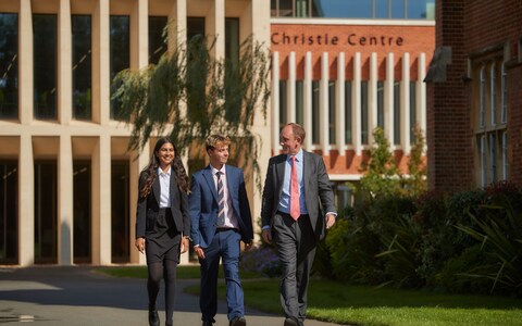 St Edward's School warden Alastair Chirnside with two sixth-formers