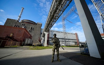  A Russian serviceman guards an area of the Zaporizhzhia Nuclear Power Station