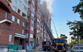 The ruins of the top floors of an apartment building in Dnipro hit by a Russian missile strike on June 28