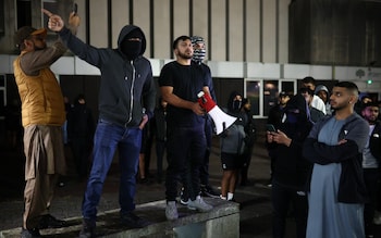 Protesters are seen outside Rochdale Divisio<em></em>nal Headquarters 
