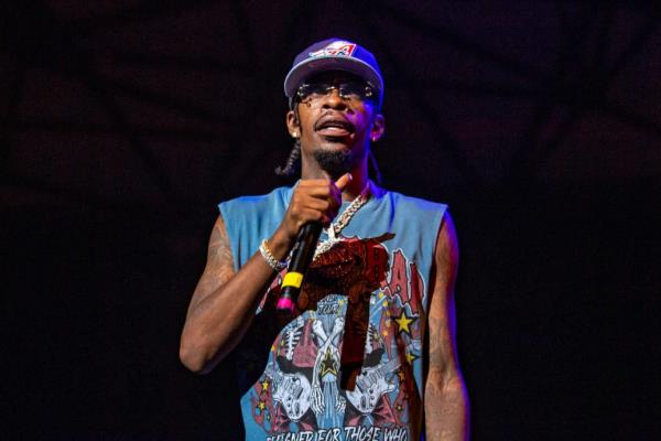Rich Homie Quan performs o<em></em>nstage at The Aretha Franklin Amphitheatre on September 01, 2023 in Detroit, Michigan. 