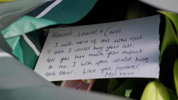 A message on a floral tribute near to the scene in Ashlyn Close, Bushey, Hertfordshire, wher<em></em>e the wife and two daughters of a BBC sports commentator have been killed in a crossbow attack at their home. Carol Hunt, 61, who was married to BBC Five Live racing commentator John Hunt, and two of their daughters died in Ashlyn Close, Bushey, Hertfordshire, on Tuesday evening. A manhunt has been launched for Kyle Clifford, 26, from Enfield, north London, who is wanted by detectives investigating the mu