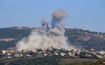Smoke billows following an Israeli airstrike in the southern Lebanese border village of Chihine