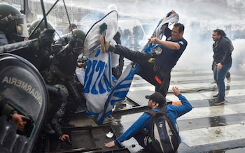 Police clash with protesters over the president's co<em></em>ntroversial reforms