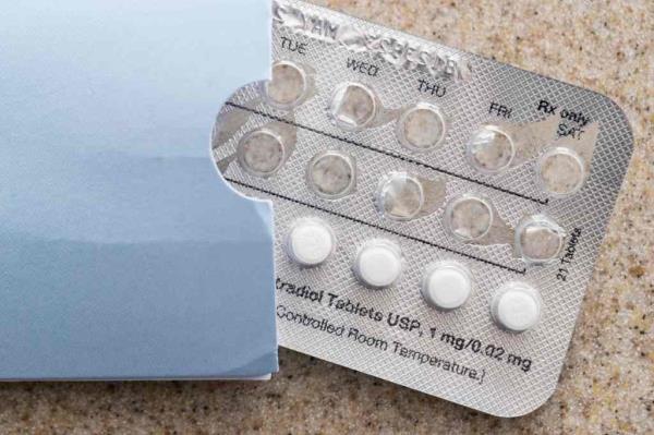 Birth co<em></em>ntrol pills blister pack on a counter.