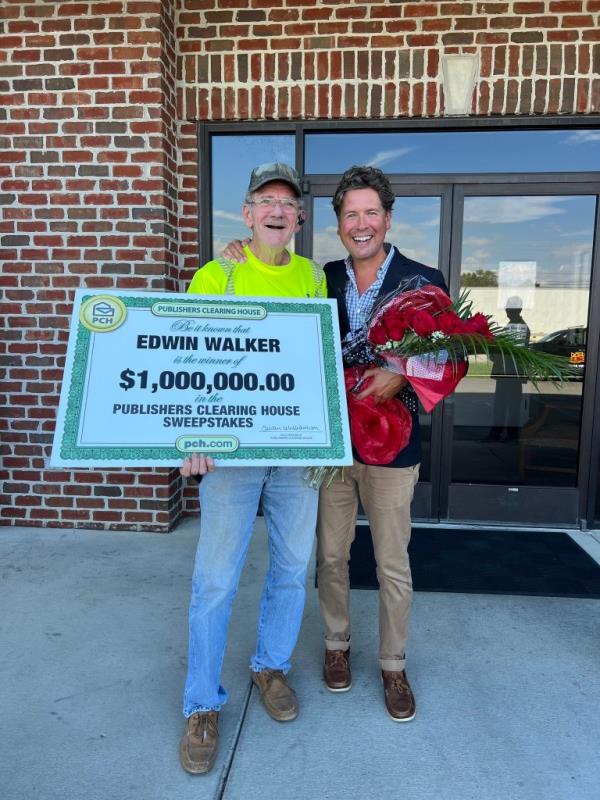 Edwin Walker was named the lucky winner of the $1 million Publisher's Clearing House sweepstakes, though he wasn't home at the time Howie Guja traveled from New York to awarded him his check.
