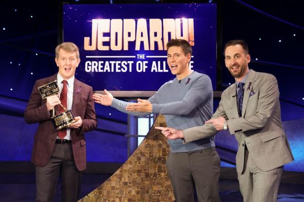 James Holzhauer's (center) playful rivalry with the trivia show host comes after Jennings (left)  beat him and Brad Rutter in the 2020 