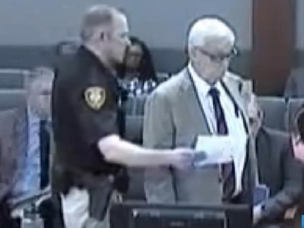A victim punched co<em></em>nvicted molester Richard Gross during a sentencing hearing on October 2