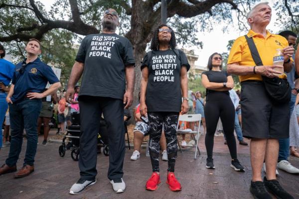 Demo<em></em>nstrators listen to a speaker during a rally against white supremacy at James Weldon Johnson Park August 28, 2023 in Jacksonville, Florida. Police say that the attack by a gunman on Black customers at Dollar General store (Getty Images)