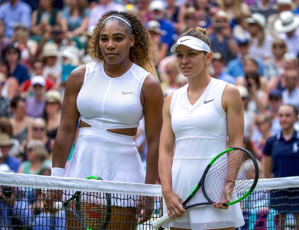Serena Williams (left) and Simona Halep before the start of the Ladies Singles Final on Centre Court during the Wimbledon Lawn Tennis Champio<em></em>nships at the All England Lawn Tennis and Croquet Club at Wimbledon on July 13, 2019 in London, England.